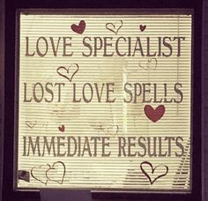 a sign that says love specialist lost love spells immediate results on the window sill