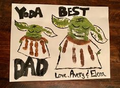 a child's drawing of two baby yoda characters on a piece of paper