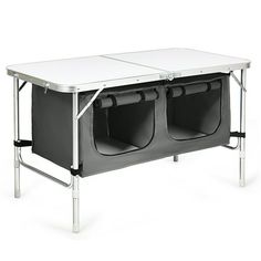 a white table with two black seats on the top and one is closed up to show it's contents