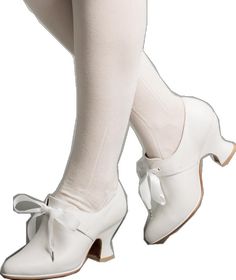 Formal Low Heel Dance Shoes With Rubber Heel Cap, Elegant Fitted Wedding Shoes For Dance, Elegant Round Toe Dance Shoes, Elegant Dance Shoes With Round Toe, White Round Toe Dance Shoes For Formal Occasions, Elegant Dance Shoes With Reinforced Low Heel, Elegant Dance Shoes With Leather Sole And Round Toe, Almond Toe Dance Shoes With Leather Sole, Elegant Closed Toe Court Shoes With Wooden Heel