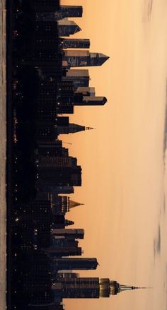 the skyline of new york city at sunset