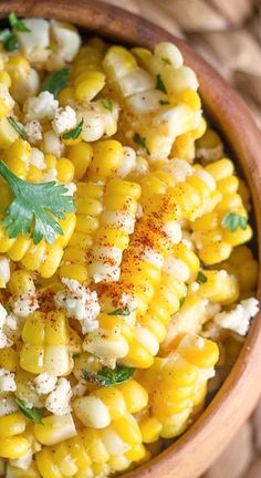 corn with herbs and seasoning in a bowl