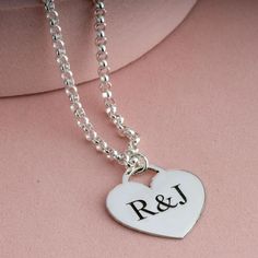 "Heart pendant necklace with personalized engraving from real silver 925. You can engrave a word, a name, 2 letters with an & or ♥ sign between them, a date or anything else that will make the necklace personal and special. Up to 7 characters can be engraved. MATERIALS * Material: High-Quality 925 Sterling Silver * Chain style : ROLO  * Handmade item SIZES * Pendant size: 20x20mm * Chain Length: 14\" / 16\" / 18\" / 20\" / 22 *Each necklace comes with an 2\" extender So size 14\" matches sizes 1 Engraved Heart Necklace, Sterling Silver Heart Pendant, Silver Chain Style, Silver Heart Pendant, Personalized Pendant, 925 Sterling Silver Chain, Engraved Necklace, Initial Pendant, Sterling Silver Heart