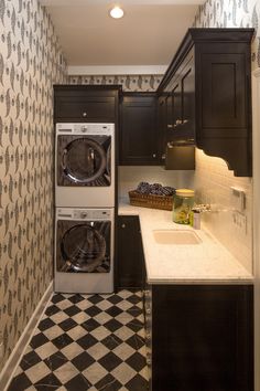 a washer and dryer in a small room