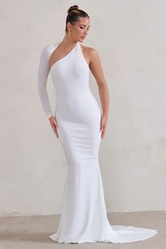 Channel Hollywood glamour as we enter wedding season in this floor-sweeping white showstopper. Crafted from flattering stretch jersey fabric. our Katarina maxi dress flaunts a wrapped cut-out neckline with a single long sleeve and an exposed shoulder. Katarina's long skirt trails from behind in theatric fashion. making you and your silhouette truly unforgettable.Features- Premium stretch jersey- Wrapped cut-out neckline- Single long sleeve- Bodycon fit- Fishtail skirt with train- Maxi length Siz Fishtail Maxi Dress, Black Dress Prom, Black Tie Gala, Fishtail Skirt, Glamour Dress, Christmas Party Dress, Black Velvet Dress, Long Sleeve Bodycon, Red Mini Dress