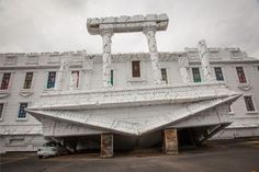 a large white building with columns and windows