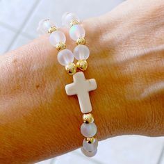 White Spiritual Rosary Bracelet, Spiritual Moonstone Stretch Bracelet With Round Beads, Spiritual Stretch Bracelet With Moonstone Round Beads, Adjustable Spiritual Moonstone Stretch Bracelet, White Beaded Rosary Bracelet For Healing, White Spiritual Stretch Bracelet With Faceted Beads, Beaded Cross, Moonstone Beads, Cross Bracelet