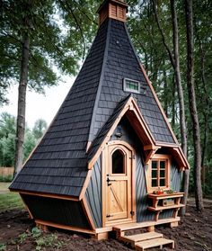 a small wooden house in the woods