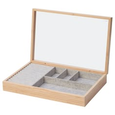 an empty wooden box with four compartments