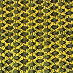 a yellow and black background with lots of small green circles on it's surface