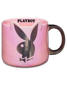 Your morning routine just got cuter with this officially licensed Playboy mug! With a classic rabbit head logo and pretty pink and black hues, this mug will quickly become your favorite. Officially licensed Exclusively at Spencer's Dimensions: 4" H x 6.3" W x 4.4" D Capacity: 20 oz. Material: Ceramic Care: Gently hand wash only Imported Pink Playboy Bunny, Sleepover Room, Pink Playboy, Rabbit Head, Spencers Gifts, Goth Home, Goth Home Decor, Playboy Bunny, Room Makeover Inspiration