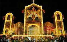 a church decorated with christmas lights and decorations