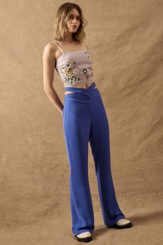 Here and Now Crisscross Waist Tie-Back Flare Pants - ShopPromesa Cut Out Drawstring Pants, Stretch Rayon High-waisted Pants, High-rise Fitted Pants With Zipper Closure, Low Rise Woven Pants, Groove Super-high-rise Flared Pant, Vintage Canvas, Invisible Zipper, Floral Chiffon, Iron Decor