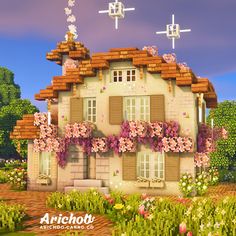 an image of a house with flowers on the front and windows in the back ground