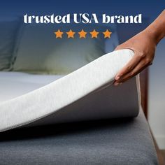 a person is pulling out a mattress from the bed with five stars on it and text that reads, trusted usa brand