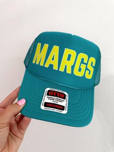 Margs Trucker Hat Made to Order | Summer Trucker Hat | Party Trucker Hat  Details -  - Foam & Polyester with mesh backing. - Braided top detail  - Adjustable back snaps. - One size fits most Note -  - Trucker Hats are shipped Monday - Friday excluding holidays.  - Each order is shipped to the address provided. If there is an issue with the customers provided address we are not responsible for lost or stolen packages.  - If interested in custom hats please send us a message. - No Returns on Hat P Cheap Green Trucker Hat For Outdoor Activities, Retro Adjustable Mesh Hat, Retro Mesh Cap, Green Trucker Hat With Letter Print For Summer, Green Summer Trucker Hat With Letter Print, Summer Green Trucker Hat With Letter Print, Green Visor Hat With Letter Print, Green Snapback Hat With Short Brim For Summer, Curved Brim Mesh Hats With Letter Print