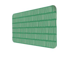 a close up of a green mat with white lines on it