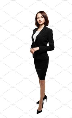 a woman in a business suit standing with her hands on her hips and looking at the camera