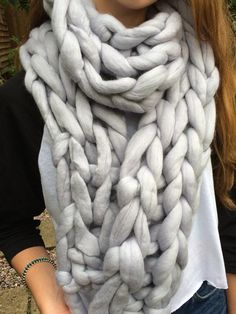 Handmade using beautifully soft Merino wool, this chunky long length rib scarf will help keep you toasty and warm throughout the cold winter months and would make a great gift for someone special.  The images above show this beautiful handmade scarf in the Seal Grey option but as this is a handmade item it is available in lots of other colours. (see the image above and the colour preferences in the drop down list)Once knitted up, each scarf gets carefully hand processed to make the Chunky Merino Cozy Chunky Knit Pattern In Merino Wool, Cozy Chunky Knit Merino Wool Pattern, Cozy Chunky Knit Merino Wool Knitting Pattern, Cozy Gray Chunky Knit Pattern, Chunky Knit Scarf, Scarf Chunky, Ribbed Scarf, Chunky Knit Scarves, Handmade Scarf