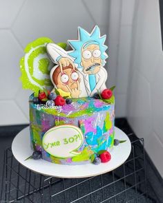 a cake decorated with cartoon characters on it