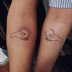 two people with matching tattoos on their arms