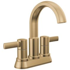 a faucet with three different handles and nozzles on the side, in gold