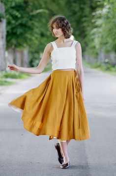 Our universally flattering full circle Linen Wrap Skirt carries a chance of becoming one of the favorite linen pieces of your timeless wardrobe. Its waist is adjustable thanks to several strategically placed strings, and of course, it has two side seam pockets. Enjoy its white interior lining on the bottom hem of the skirt, which will add a wonderful touch of grace, elegance and femininity to your everyday look! Discover more from Sondeflor Shop here: https://www.etsy.com/shop/SondeflorShop Join our newsletter community and receive 10% OFF your first purchase! Sign up here: https://tinyurl.com/2vdrvbr6 SKIRT DESIGN FEATURES - Full Circle Skirt - Side seam pockets - Below the knee length - White interior lining on the bottom hem MATERIAL & CARE ✔Made from 100% linen, pre-washed & softened. Cottagecore Skirt, Linen Skirts, Skirt Cottagecore, Linen Wrap Skirt, Midi Wrap Skirt, Skirt Wrap, Evening Skirts, Classic Skirts, New Years Outfit