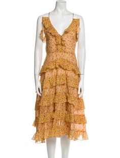 Maje A-Line DressOrangeFloral PrintRuffle EmbellishmentSleeveless with Plunge NecklineFit:Dresses by Maje typically fit small, consider taking a size up. Zimmermann Dress, Saint Laurent Bag, Midi Length Dress, Balenciaga City Bag, Hat Shop, Casual Jeans, Jacket Tops, Chanel Classic Flap, Midi Length