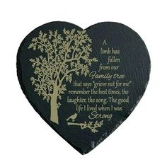 a heart shaped plaque with a tree and poem on the front, in gold foil