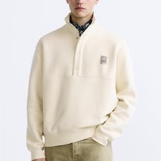 New With Tags. Zara Men Sweatshirt. Size S Casual Cream Polo Sweater With Ribbed Collar, Casual Cream Polo Sweater For Winter, Casual Cream Crew Neck Polo Sweater, Casual Cream Polo Sweater, Casual Beige Polo Sweater, Casual Cream Sweater With Button Closure, Cream Relaxed Fit Sweater, Casual Beige Zara Sweater, Zara Casual Beige Sweater