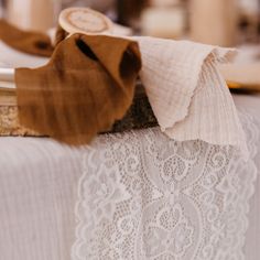 a table cloth with a brown bow on it