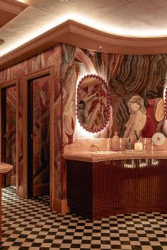 the bathroom is decorated in art deco style