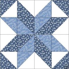 a blue and white quilt block with an intricate star design on it's center