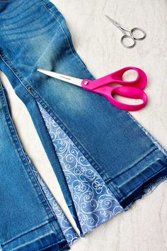 This 70’s girl shows you how to make jeans into bell bottoms. This is a groovy upcycle project that you'll love and use to make pants fun!!! #WelcometoNanas #DIYBellBottoms #UpcycleProject #BellBottomJeans How To Turn Pants Into Bell Bottoms, Jeans With Seam In Middle, How To Style Bell Bottoms Jeans Winter, Upcycle Bell Bottom Jeans, Diy Bell Bottom Pants, Making Bell Bottoms Out Of Jeans, Turn Jeans Into Bell Bottoms