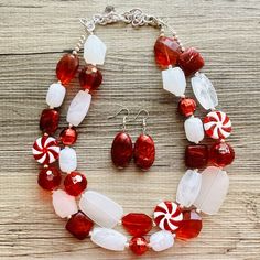 💞Two of a kind & ready to ship💞  Great necklace for the holiday season! Various shades of red & white acrylic beads in our signature confetti style :) Approximately 16 inches long plus a 4 inch extender chain.  *Smoke and pet free home!* I ship 6 days a week! Thank you for browsing my store! Candy Cane Color Jewelry, White Beaded Christmas Jewelry, White Christmas Jewelry For Holidays, Handmade White Holiday Jewelry, White Christmas Jewelry For Festive Occasion, White Christmas Jewelry For Festive Season, White Christmas Festive Jewelry, White Festive Jewelry For Christmas, White Holiday Jewelry For Festive Occasions