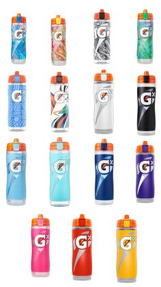 many different types of water bottles are shown in this image, including one with the letter g on it