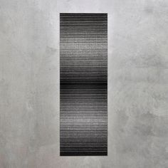 an abstract black and white photo with vertical lines