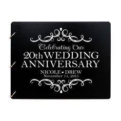 a black and white wedding anniversary plaque with the words, celebrating our 10th wedding anniversary