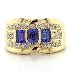 Le Vian 18k Yellow Gold Tanzanite With Vanilla Diamond Ring 6 Grams Ring Size 7.5 3 Stone Emerald Cut Tanzanites   Round Vanilla Diamonds  This is a beautiful Le Vian ring. The ring is stamped and has been polished to look brand new. The tanzanites are slightly abraded. This is an absolutely gorgeous ring that is being sold for a fraction of its retail value! If you have any questions or concerns please do not hesitate to ask.  serial number: AJ1036693 Yellow Gold Tanzanite Rings With Brilliant Cut, Yellow Gold Tanzanite Diamond Ring With Accent Stones, Yellow Gold Three Stone Gemstones Fine Jewelry, Fine Jewelry Tanzanite Three Stone, Yellow Gold Tanzanite Multi-stone Ring, Fine Jewelry Yellow Gold Tanzanite Rings, Anniversary Three-stone Tanzanite Jewelry, Tanzanite Three-stone Ring For Anniversary, Tanzanite Three Stone Rings For Anniversary