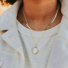 The Isabelle Locket Necklace is a highly requested piece that is sure to carry meaning that you can keep close to your heart. Gold filled or sterling silver lock available on a 17.5" or 19" chain. Reversible locket for however you choose to style (front of locket features pearlescent face, back of locket features etched detail pattern. Everyday Medallion Jewelry With Adjustable Chain, Everyday Oval Locket Necklaces, Oval Locket Necklace For Everyday, Everyday Jewelry With Box Chain And Initial Pendant, Oval Locket Jewelry For Everyday, Everyday Jewelry With Initial Pendant On Box Chain, White Charm Necklaces For Layering, White Oval Necklace With Delicate Chain, Everyday Locket Pendant Charm Necklace