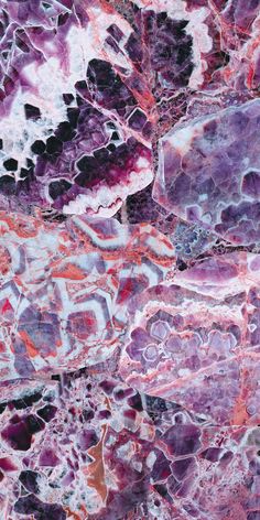 an abstract painting with purple and red colors on the surface, as if it were marbled