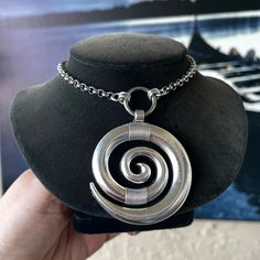 Handmade . Big Silver Plated Spiral Charm On Stainless Steel Rolo Chain Necklace . Necklace Is 18 Inch Long . ( If You Need A Different Size Lmk ) . Tags : Gem / Gems / Gemstones / Crystals / Stones / Boho / #Bohemian / #Bohochic / Goth / Gothic / Punk / Emo / Victorian / Queen / Viking / Celt / Celtic / Moon Child / Witch / Fairy / Mermaid / Unicorn / Rock & Roll / Rocker / Rock Chic / Biker / Gift / Stylish / Trendy / Festival / #Silver Choker Necklaces / Statement Piece / Casual / Every Day Jewelry / Night Out / Date Night / Going Out / Party / Clubbing / Medieval Fair / Renaissance / Princess / Pin Up / Rockabilly / Hippi Handmade Silver Alloy Charm Necklaces, Handmade Silver Charm Necklace In Alloy, Silver Sterling Silver Wire Wrapped Charm Necklaces, Silver Wire Wrapped Sterling Silver Charm Necklaces, Vintage Silver Stainless Steel Necklaces, Silver Bohemian Charm Necklace In Alloy, Wire Wrapped Sterling Silver Charm Necklaces, Nickel-free Silver Charm Necklace, Wire Wrapped Sterling Silver Charm Necklace