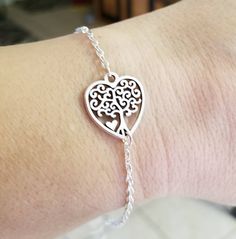 "New Handmade Tree of Life Heart Charm Bracelet ~ Perfect piece for everyday wear, special occasions, or as a great gift for someone special! ~ Silver plated cable chain bracelet ~ Beautiful heart tree of life charm ~ Lobster clasp closure ~ Measures 7\" + has a 2\" extender. ~ Ships within 24 hours of purchase Monday-Saturday" Valentine's Day Adjustable Nickel-free Charm Bracelet, Adjustable Heart Bracelet For Valentine's Day Gift For Mom, Adjustable Heart Bracelet For Mom On Valentine's Day, Mother's Day Heart Bracelet With Lobster Clasp, Valentine's Day Adjustable Heart Bracelet Gift For Mom, Mother's Day Gift Heart Bracelet With Lobster Clasp, Nickel-free Charm Bracelet For Friendship On Valentine's Day, Nickel-free Charm Bracelet For Valentine's Day Friendship, Nickel Free Heart Charm Bracelet For Friendship