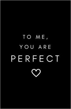 the words to me, you are perfect on a black background with a white heart