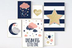 there are many cards on the wall with stars and clouds in them that say dream big little one