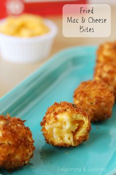 fried mac and cheese bites on a blue plate