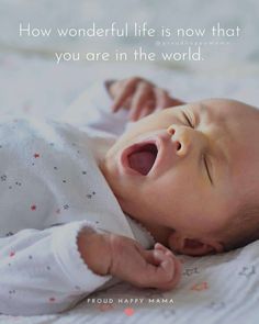 a baby laying on top of a bed next to a quote that says how wonderful life is now that you are in the world