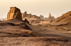 the desert is full of rocks and sand