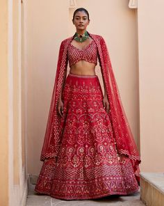 Red raw silk floral embroidered lehenga with thread work and sequence detailing paired with scallop edge v neck elbow sleeve heavily embroidered blouse and matching tulle dupatta with embroidered border and all over badla .From Chamee and Palak's The Romantics collection.DELIVERY TIMEPlease allow 8-12 weeks for your outfit to arrive.FABRIC DETAILSRaw Silk and Net Professional cleaning only. Badla Work, Raw Silk Lehenga, Bridal Lehenga Red, Vacuum Storage, Red Lehenga, Embroidered Lehenga, Lehenga Blouse, Embroidered Border, Scallop Edge