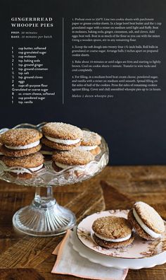 an open cookbook with cookies on plates and flowers in the backgroung